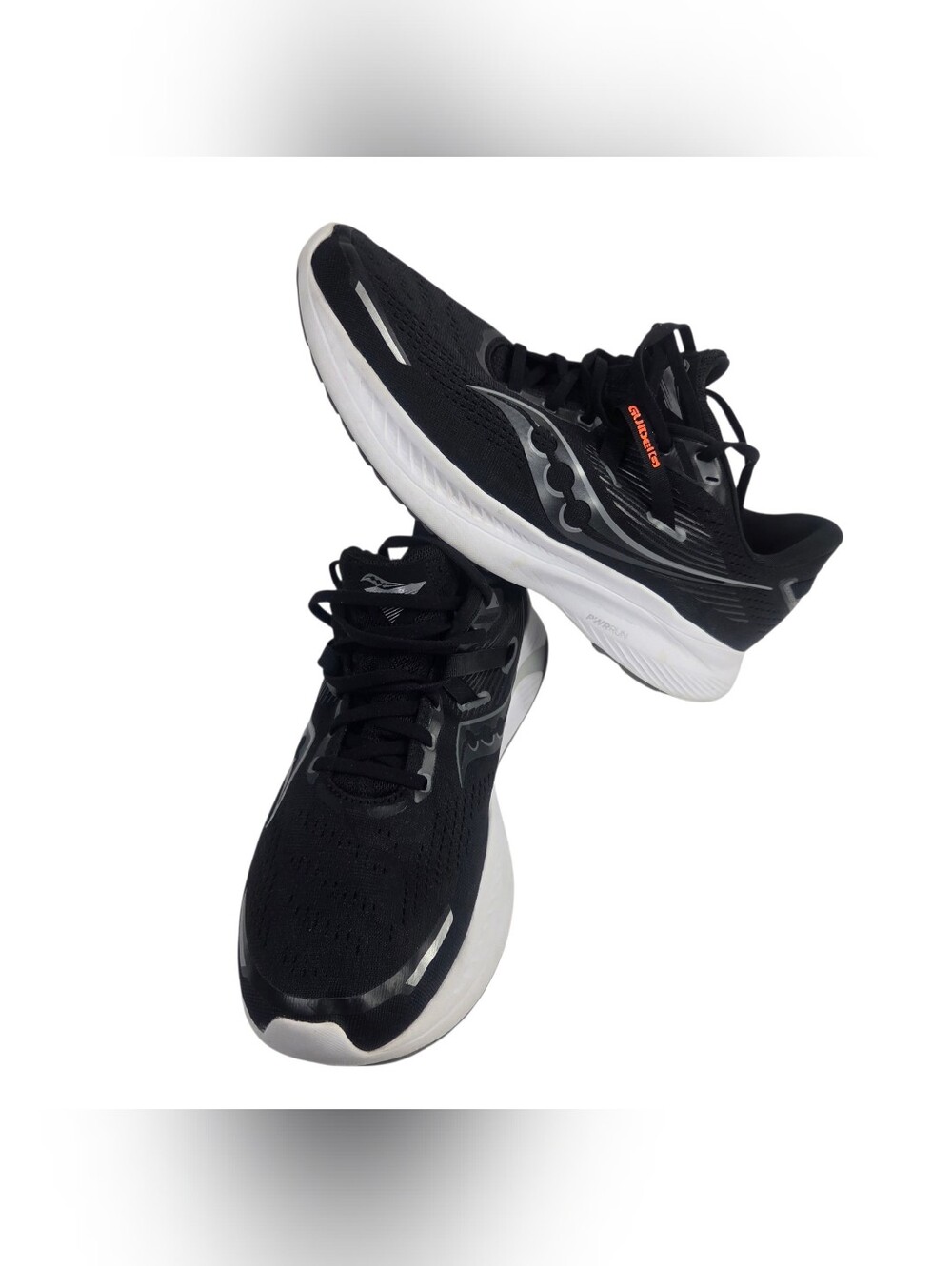 Saucony Men's Black and White Running Sneakers with Subtle Orange Accent. Sze 12